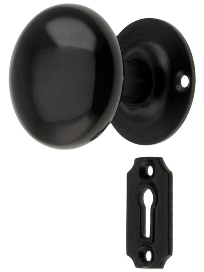 Iron Rosette Mortise Lock Set With Jet Black Porcelain Knobs in Matte Black.